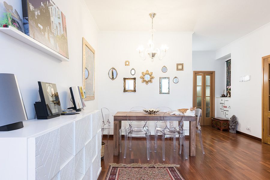 Lovely use of mirrors to decorate the small dining space