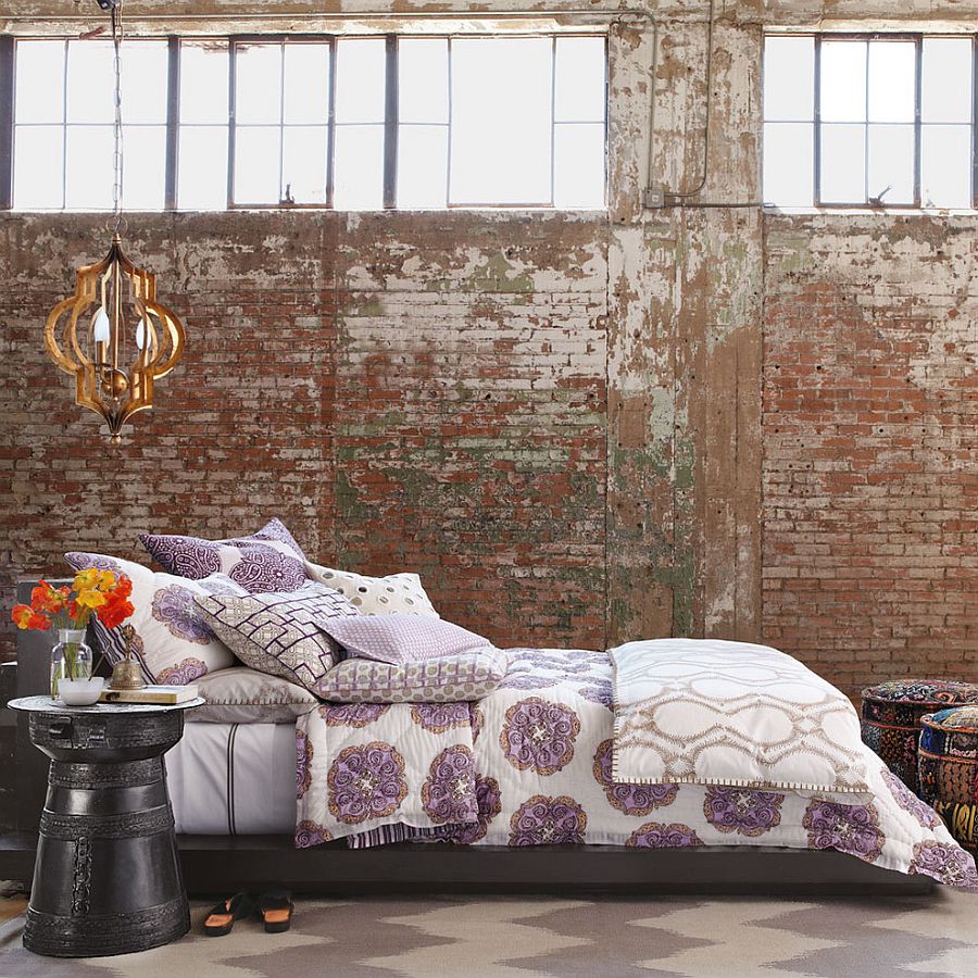 Lovely way to style a modern bedroom with exposed brick walls