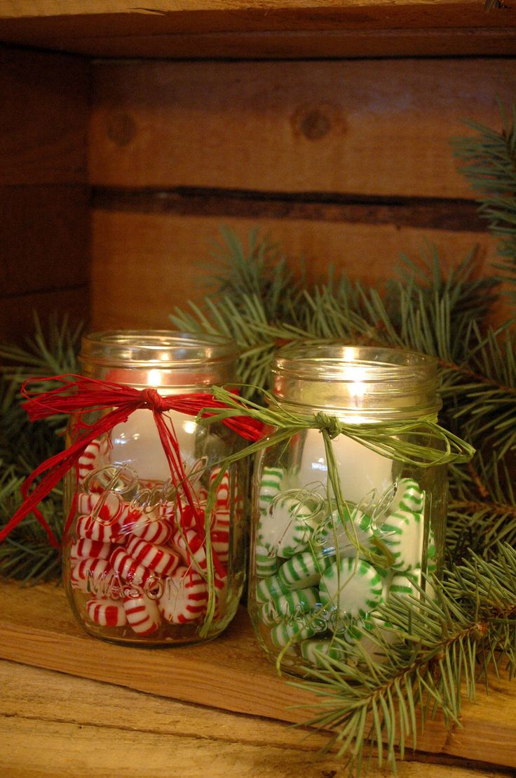 Mason jars filled with Christmas candies and candles