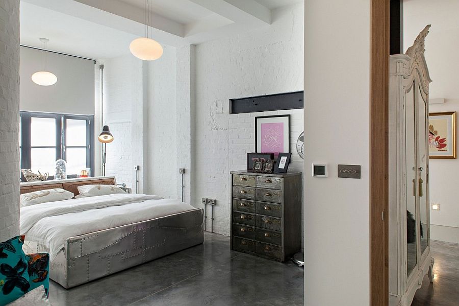 Modern bedroom in white with whitewashed brick walls and hints of shabby chic