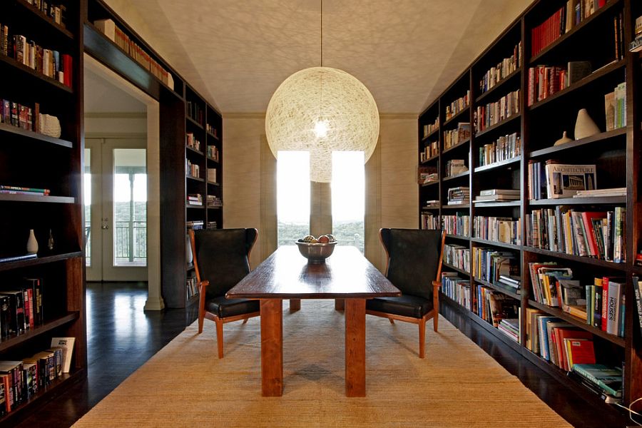 Moooi Random Light above the dining table and dark bookshelves in the backdrop [Design: Rachel Mast Design]