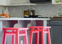 Neon-pink-bar-stools-bring-some-color-to-this-kitchen-217x155