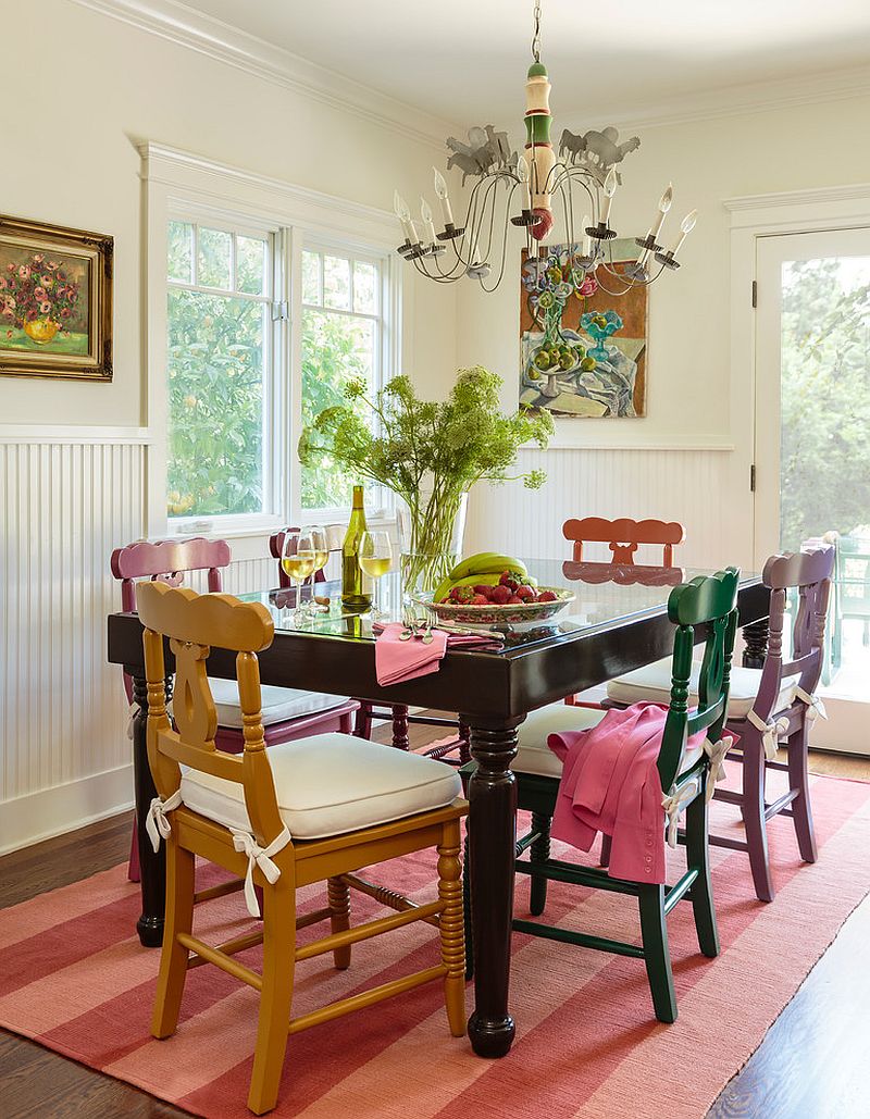 Old painted chairs and table give the dining room a classical element