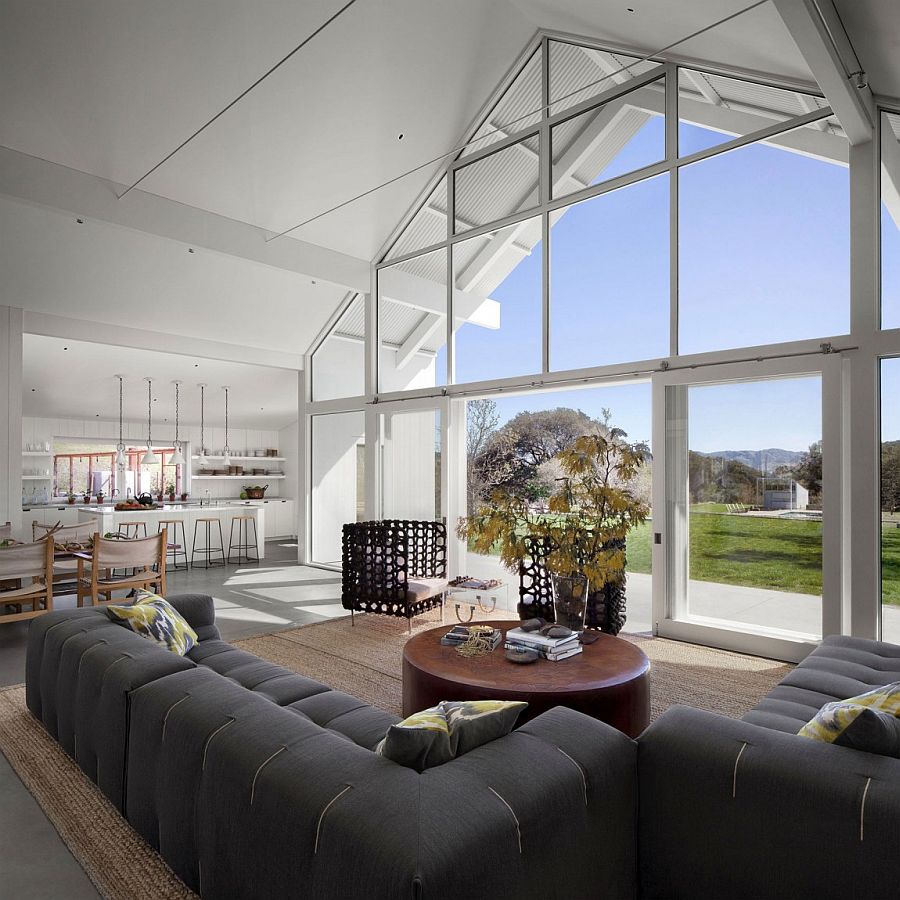 Open living area of the lovely home with a rustic backdrop