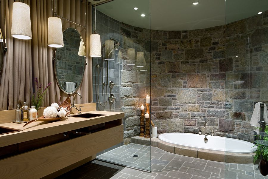 Opulent bathroom with a sunken Jacuzzi and a curved stone wall