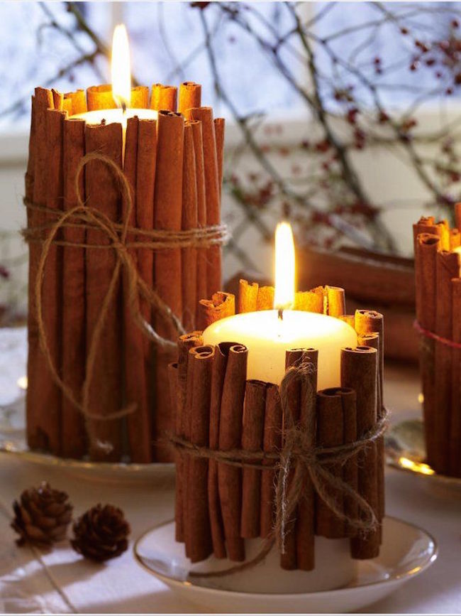 Pillar candles wrapped in cinnamon sticks - 65+ Fall Decorating Inspiration