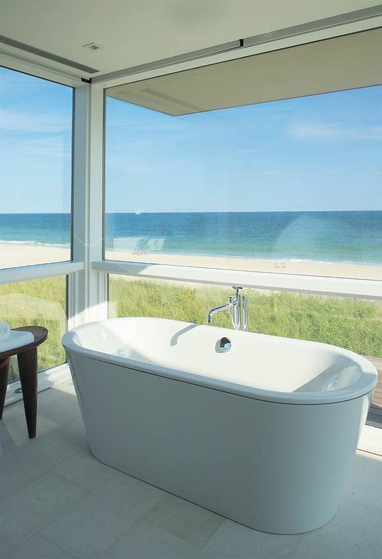 Revamped beach-front home with a bathroom that opens towards the view outside