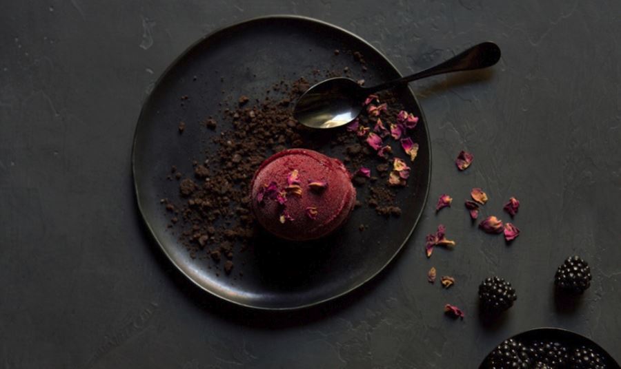 Rich, dark tones in a shot of blackberry rose sorbet