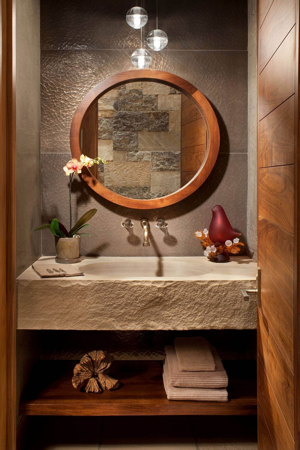 Rustic powder room with bespoke sandstone countertop and integral sink