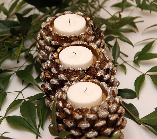 Glittery pinecone candle holders with white tea lights