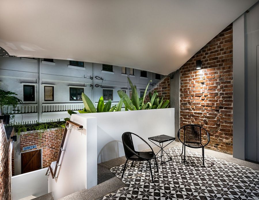 Sitting area of the suite with a view of the lush private garden