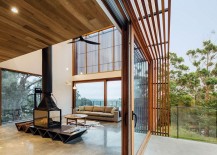 Sliding-glass-doors-connects-the-living-area-with-the-small-deck-outside-217x155