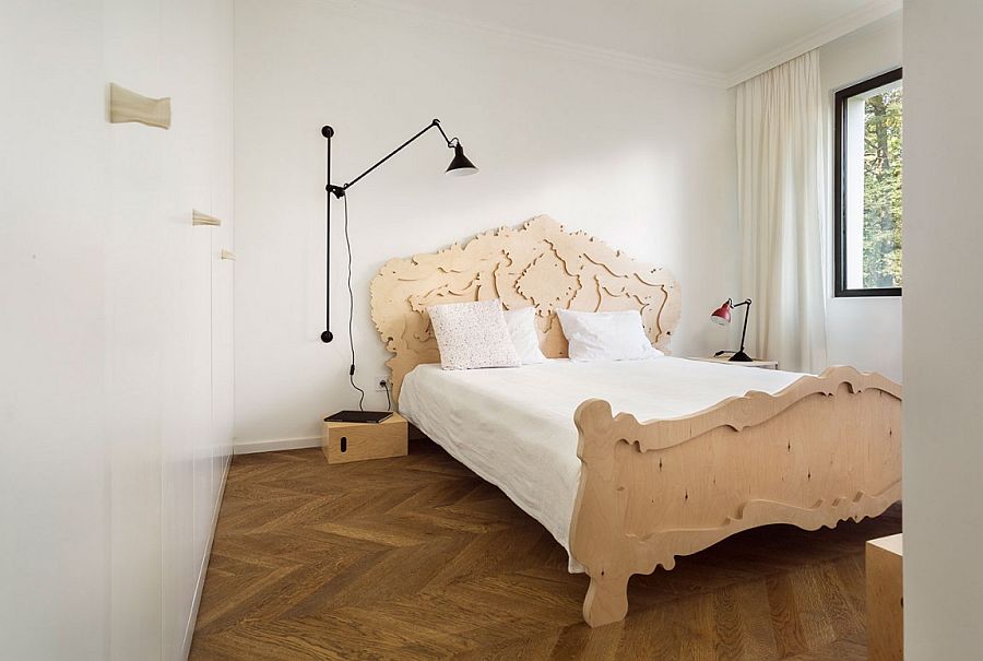 Small bedroom with bespoke plywood baroque bed