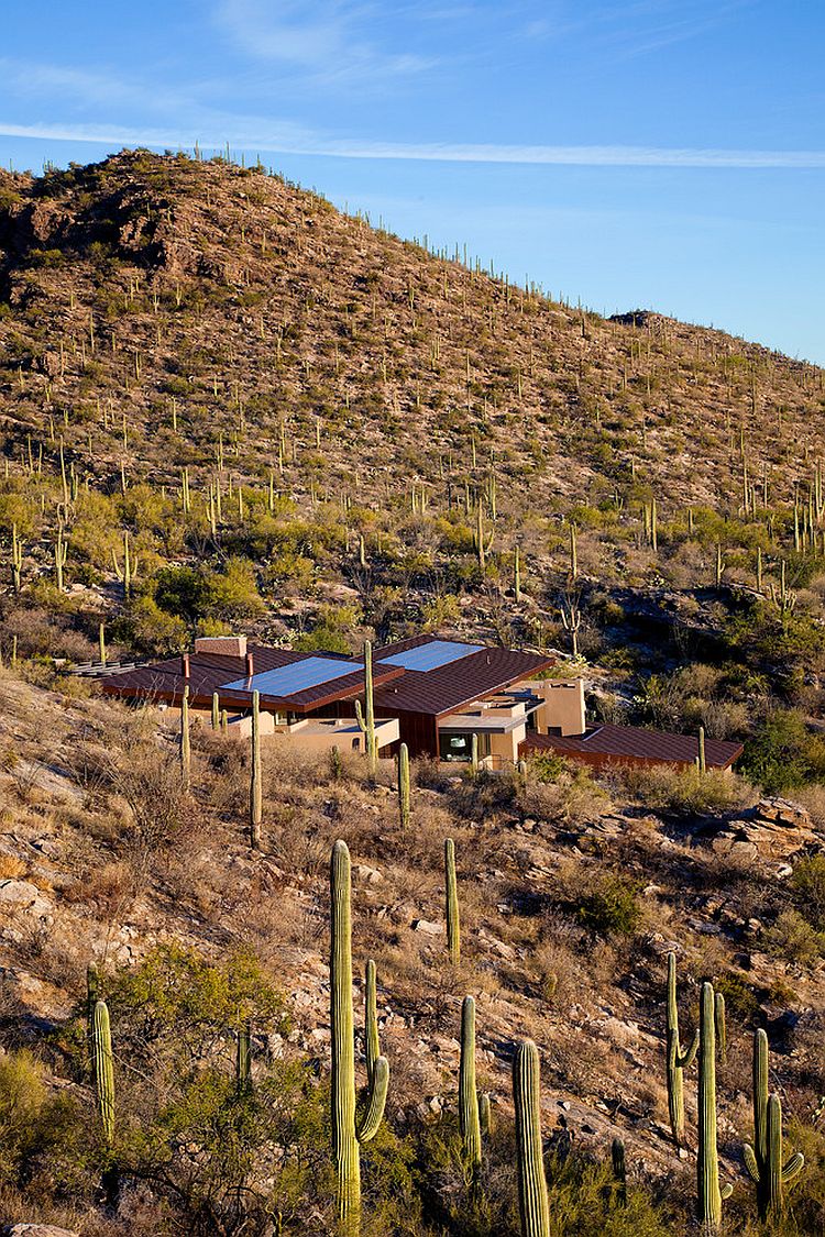 Solar panels on the roof of the house turn it into a sustainable dwelling