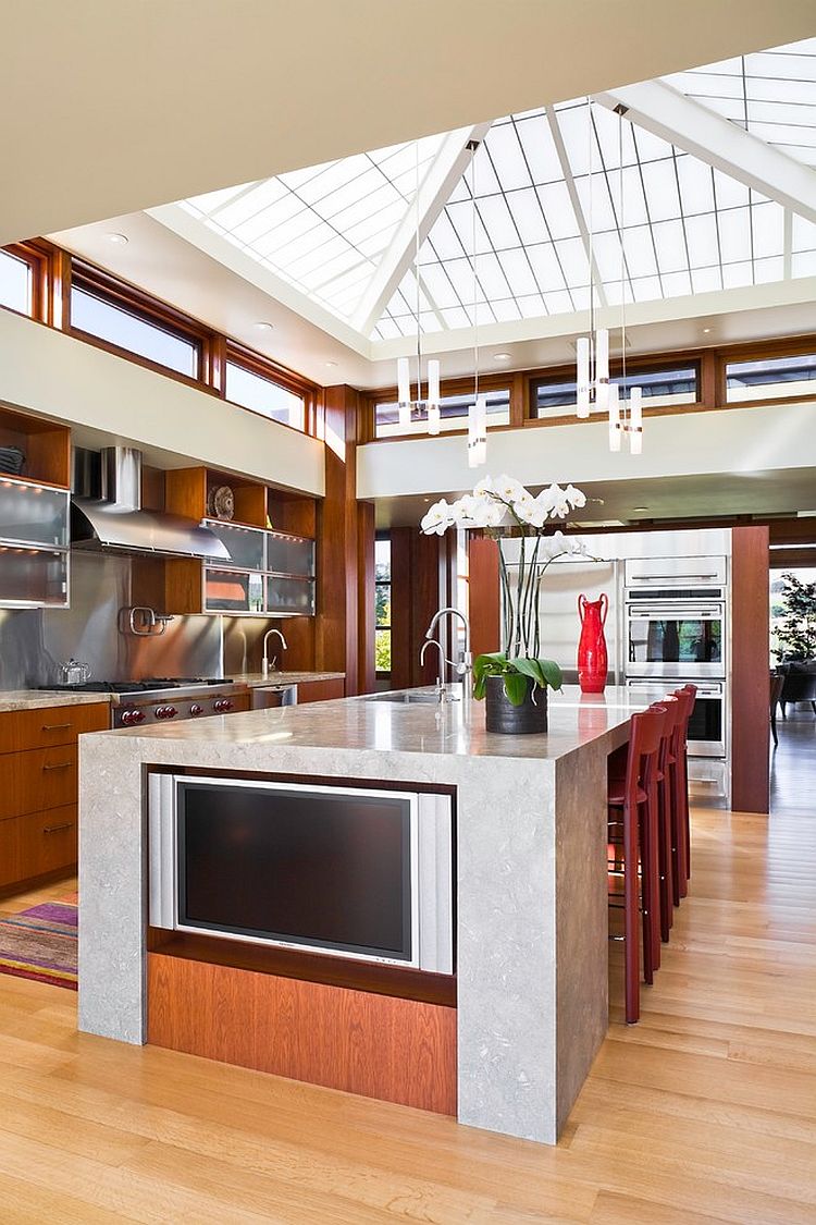 Spacious modern kitchen with a roof that gives it an airy appeal