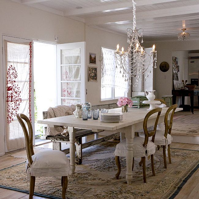Sparkling chandelier becomes the focal point in this dining room [From: Chandi Lighting]
