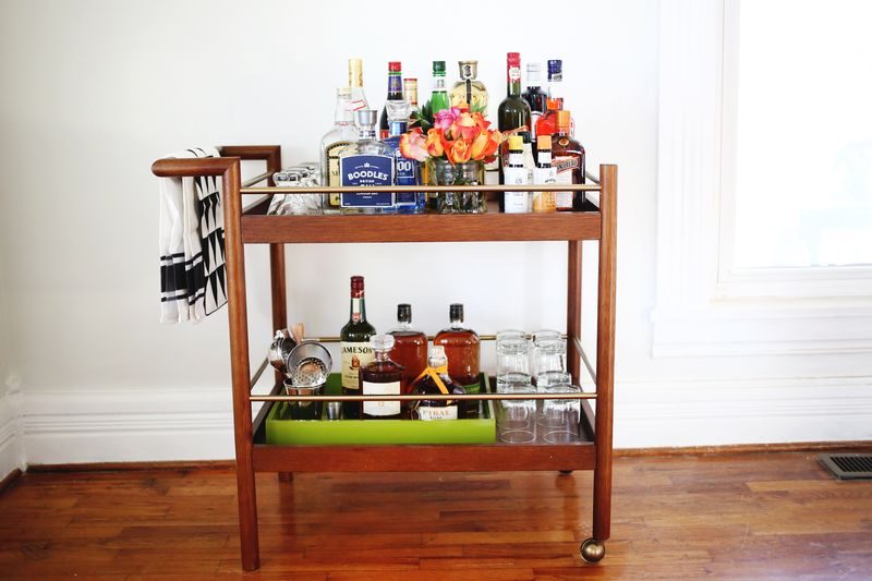 Stocked bar cart from A Beautiful Mess