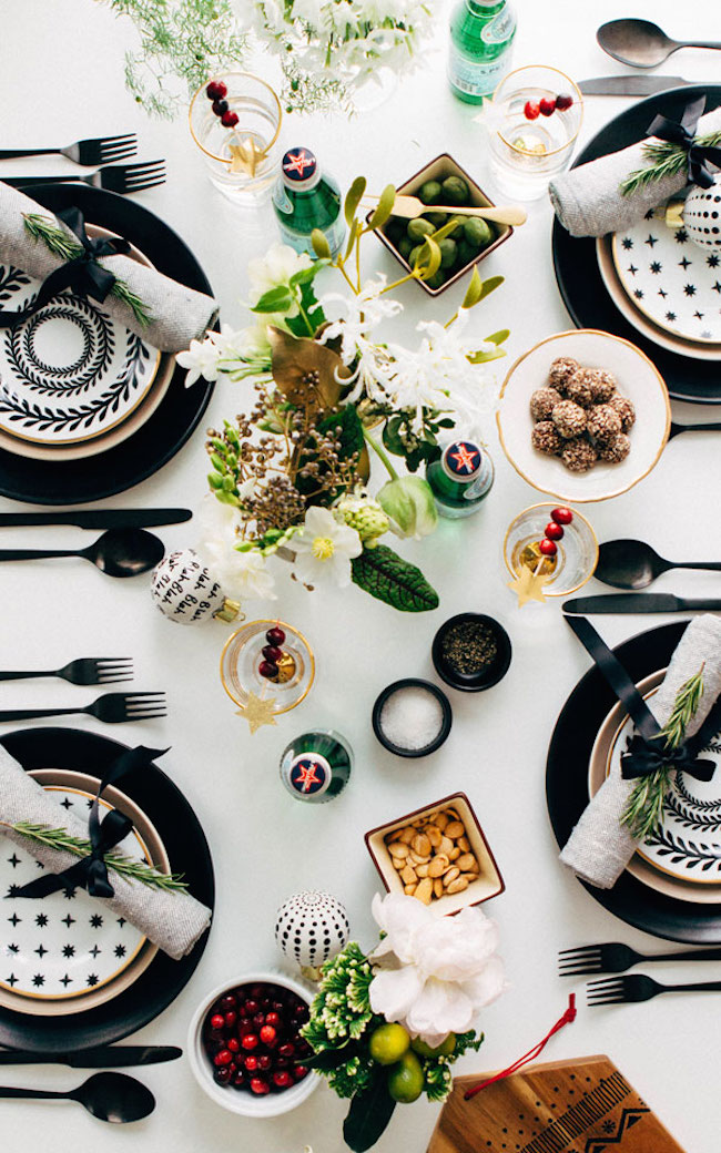 Striking black, white, and gold Christmas tablescape