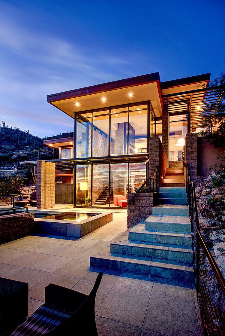 Structure of the home opes up towards the backyard and patio