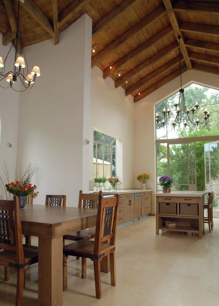 Subtle ceiling spotlights in a kitchen with high ceilings