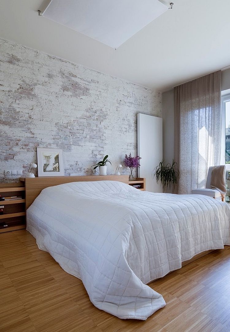 Transitional bedroom lets the brick wall shine through [Design: Nasciturus Design]