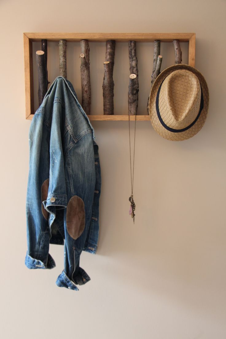 Tree branch coat hanger to hang on a wall