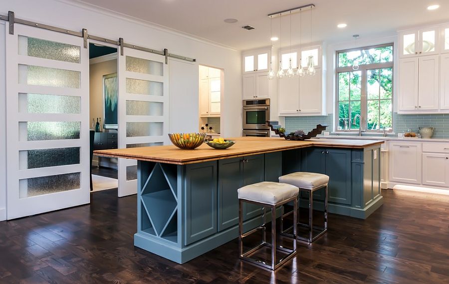 Trendy barn-style doors with frosted glass panels [Design: Barbara Gilbert Interiors]