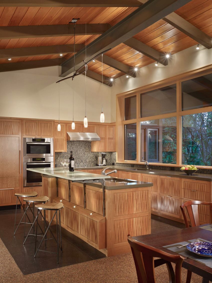 Variety of lighting selections in a modern kitchen with a warm glow