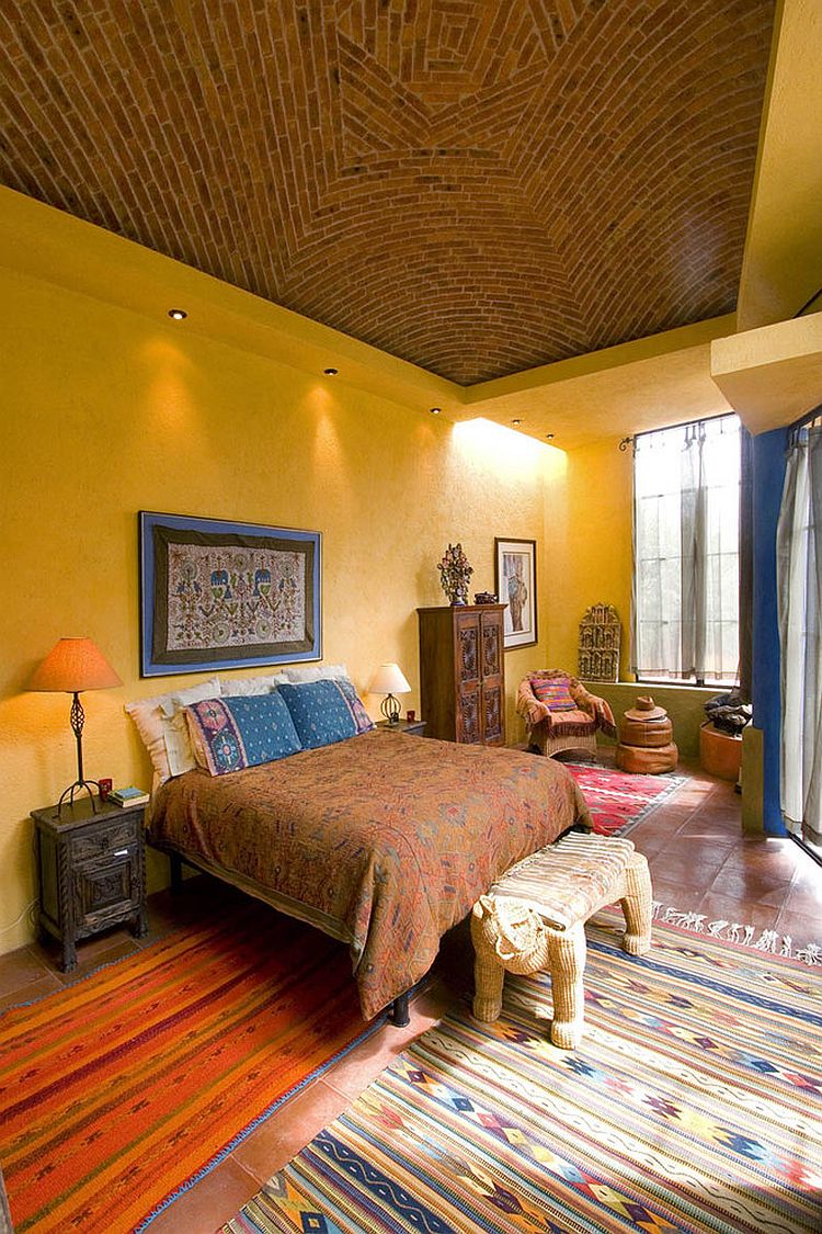 Vibrant bedroom showcases a blend of exotic styles and hues [Design: House + House Architects]