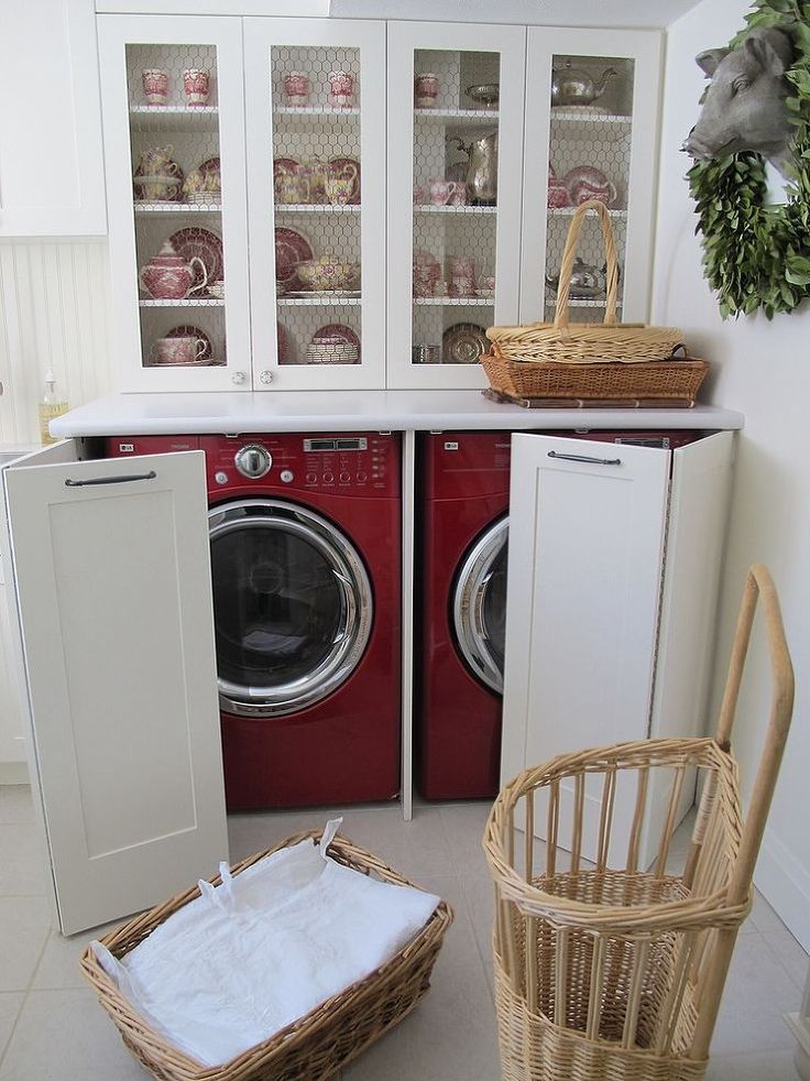 Washer and dryer hidden in a kitchen hutch