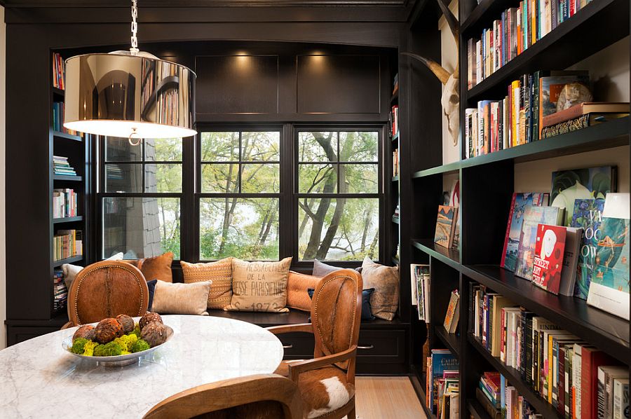 Window seat is a great addition for the cozy reading room and dining space combo [Design: Kyle Hunt & Partners / LandMark Photography]