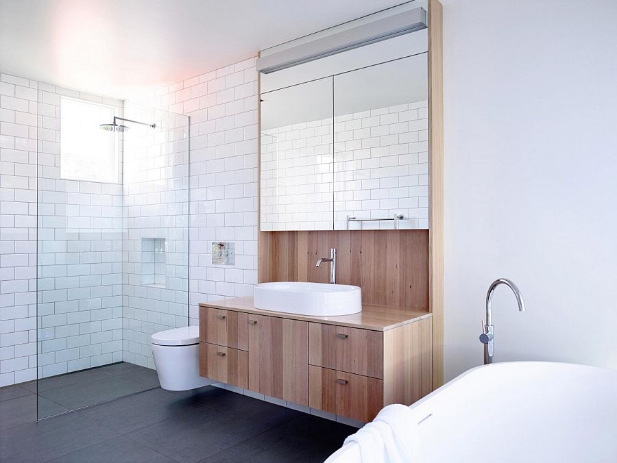 Wooden bathroom vanity unit brings textural variance to the all-white setting