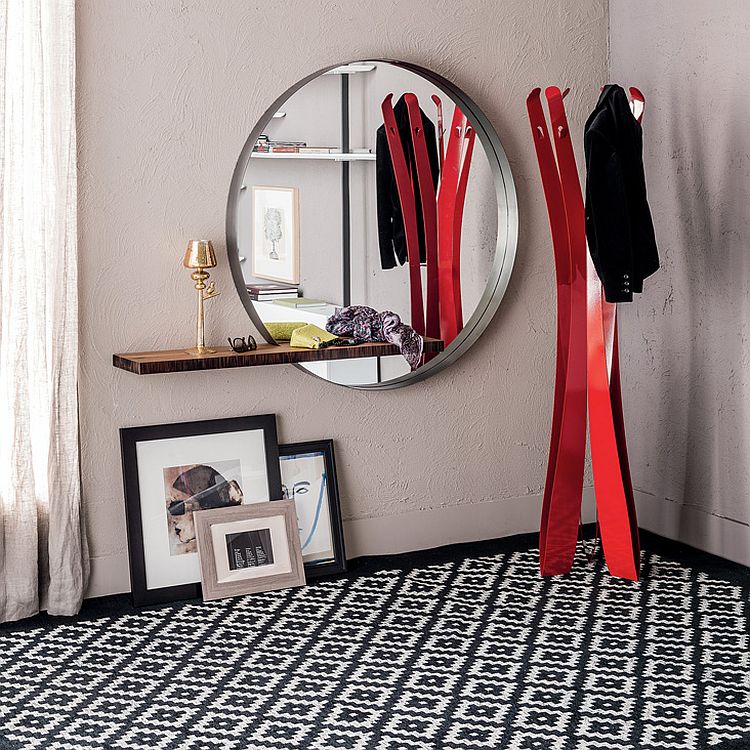 A perfect combination of round mirror and sleek shelf for the small urban interior