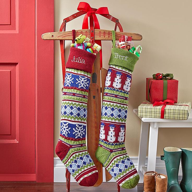 A sled holding two Christmas stockings