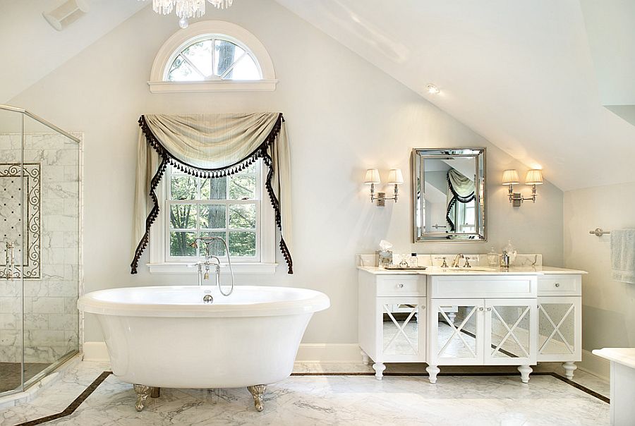 All-white bathroom with a relaxed shabby chic style [Design: Ribbon & Reed Cabinetry]