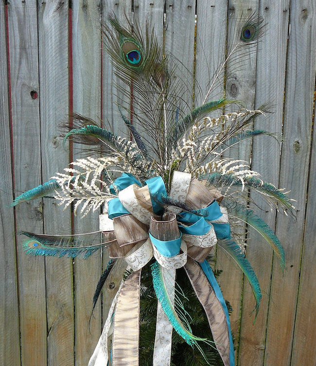 Beautiful peacock feather bow tree topper