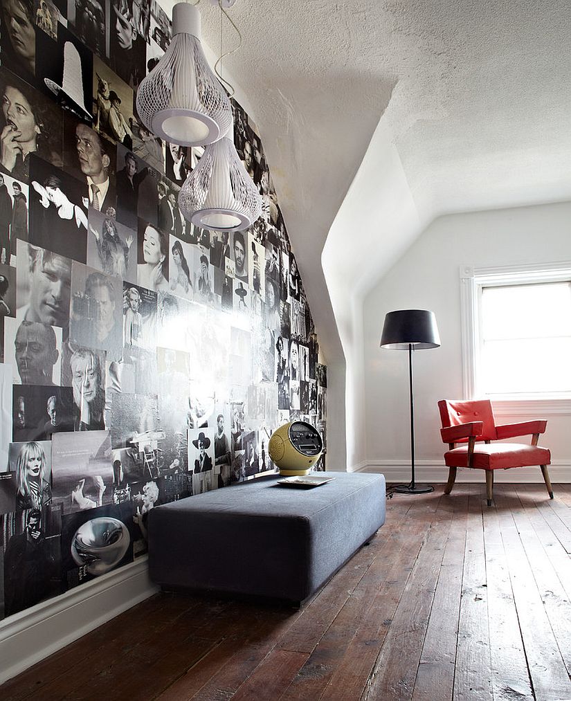 Black and white magazine photos create a stunning accent wall inside the contemporary guest room