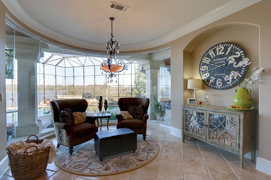 Charming sunroom of Gulfport home with curved glass wall