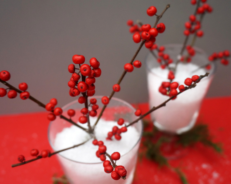 Christmas centerpiece with red berries and snow