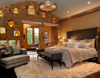 25 Bedrooms that Celebrate the Textural Brilliance of Stone Walls