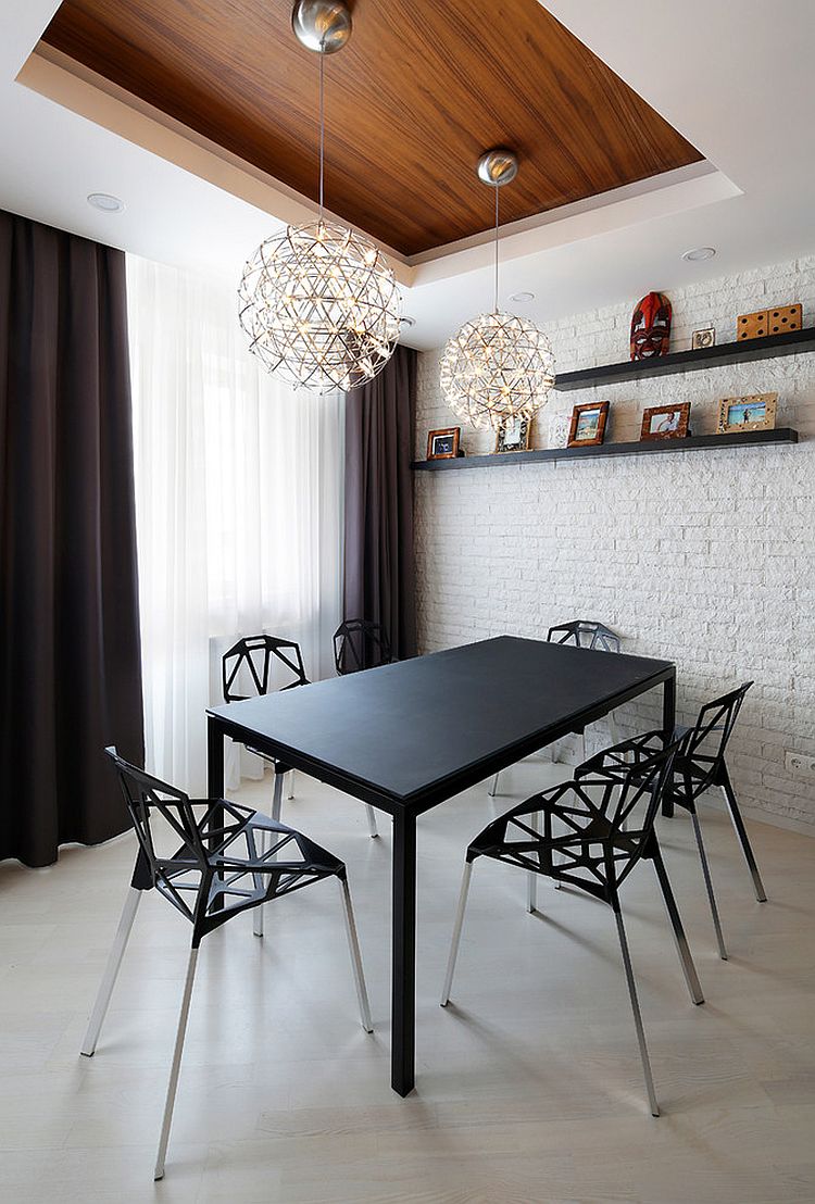 Classy contemporary decor stands out in this small dining space [Design: Olga Klevakina]