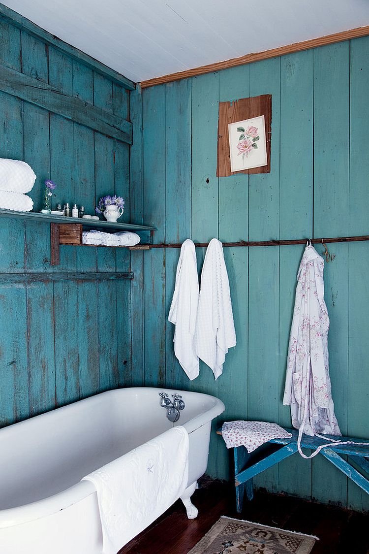 Color of the backdrop turns the small bathroom into a more spacious setting visually [Photography by Amy Neunsinger]