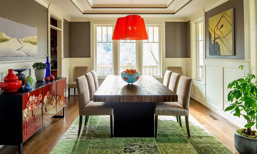 Colorful way to anchor the eclectic dining room [Design: Jason Ball Interiors]