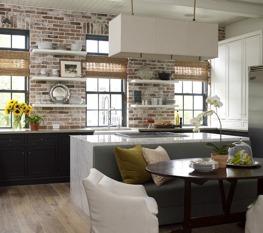 Concrete, Carrera marble and brick come together in the beautiful kitchen [Design: Kevin Spearman Design Group]