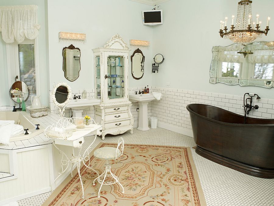 Dark bathtub brings visual contrast to the bathroom in white [Design: Greeson & Fast Design]