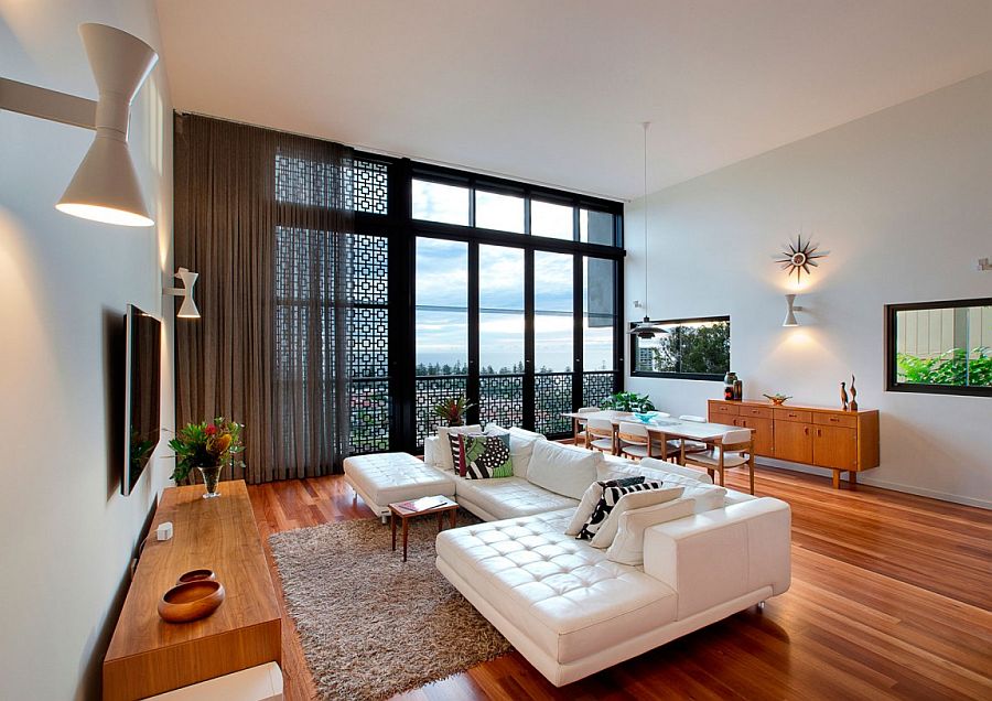 Decorative screening and drapes for the living room allow you to shift between stunning views and privacy