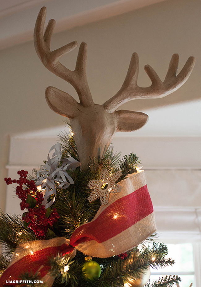 Faux reindeer head tree topper