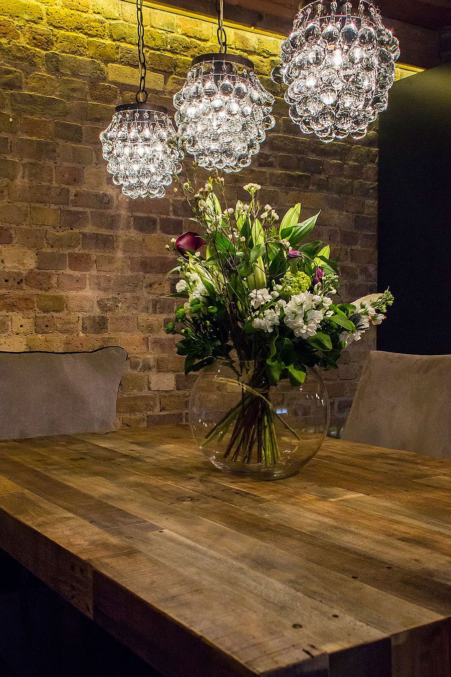 Dining space combines modern, rustic and industrial details