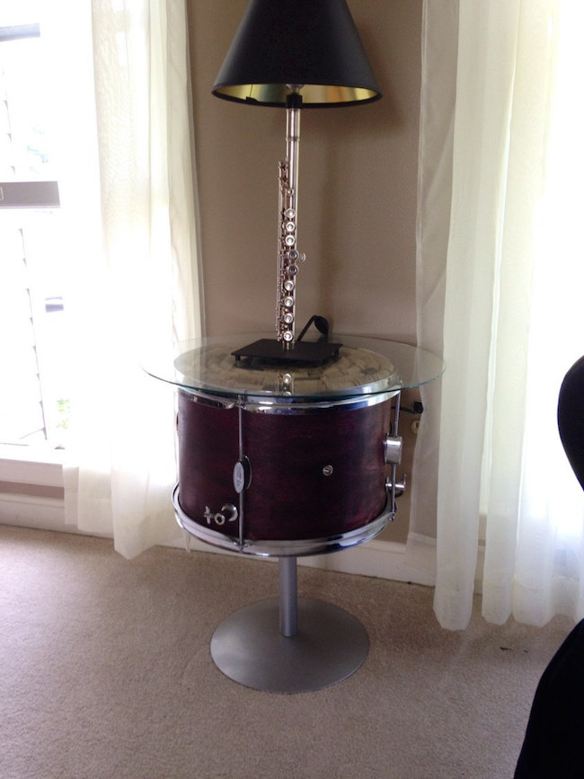 Drum side table using repurposed student tom rom drum with wine cork and glass top