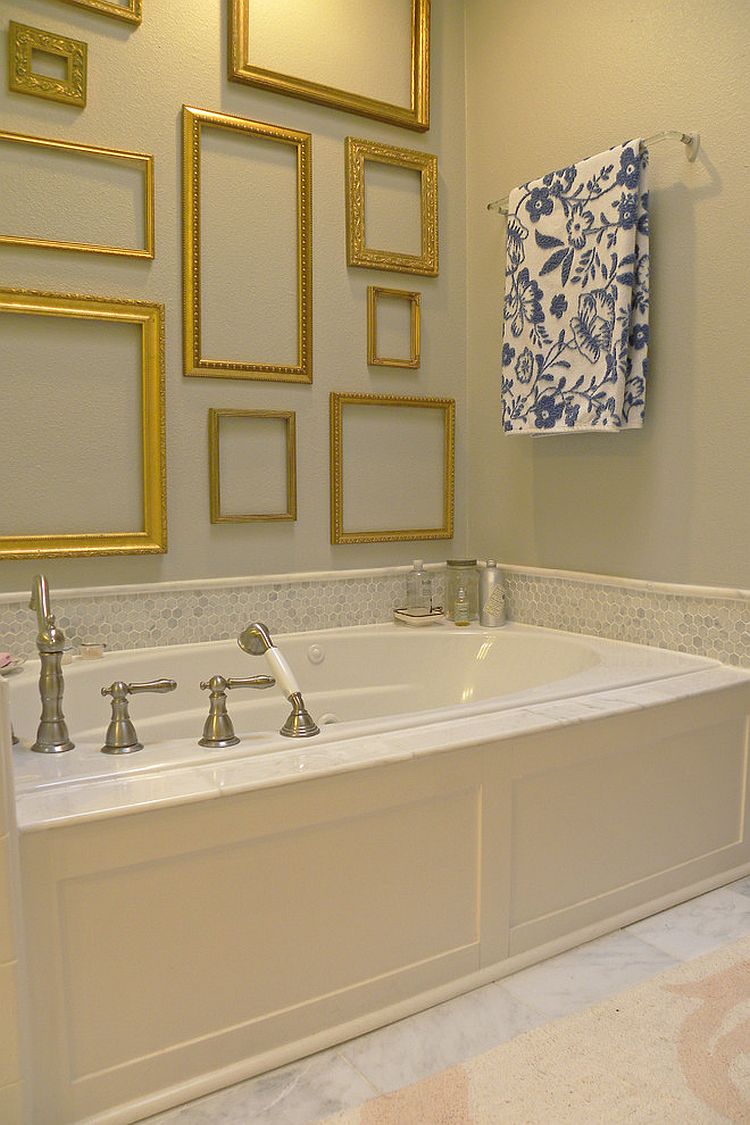 Empty picture frames add golden glint to the shabby-chic style bathroom